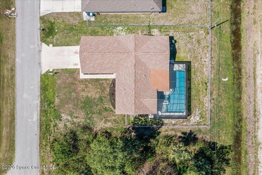 Brand New Roof! Welcome home to this beautifully renovated pool - photo 37