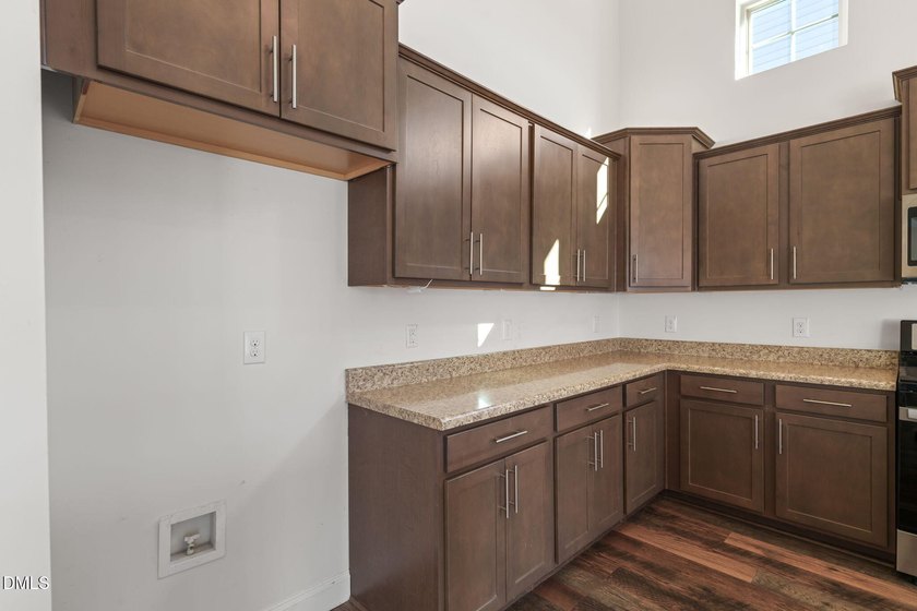 Perfect floor plan has 3 bedrooms down including the primary, so - photo 16