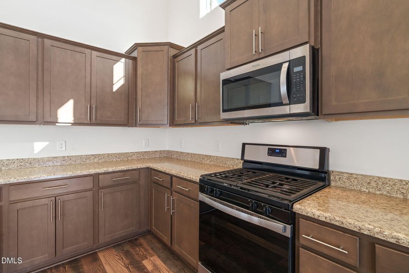 Perfect floor plan has 3 bedrooms down including the primary, so - photo 18