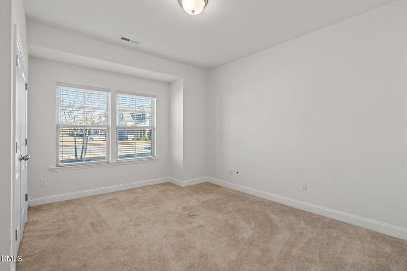 Perfect floor plan has 3 bedrooms down including the primary, so - photo 28