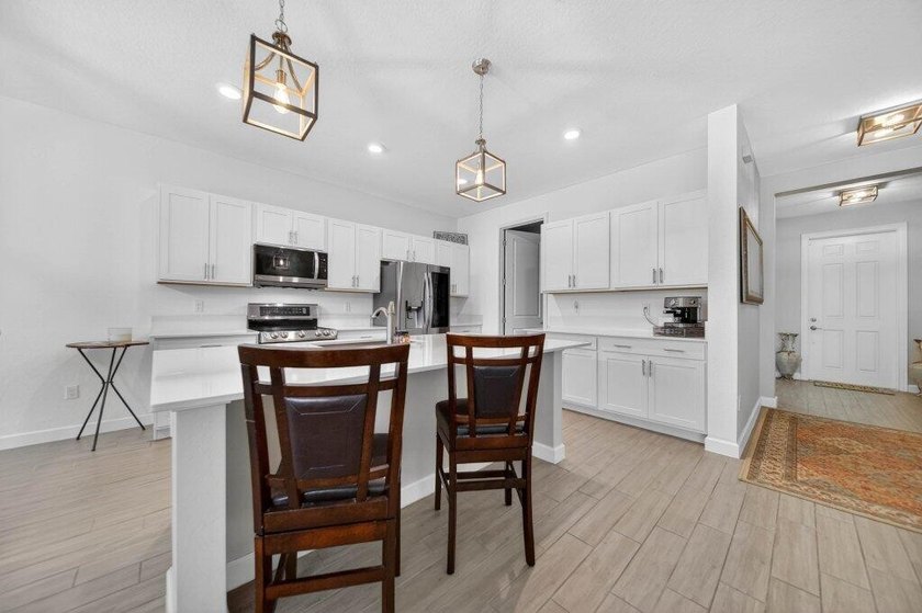 A premium Copper Creek Lennar home offering 5 bedrooms plus a - photo 13