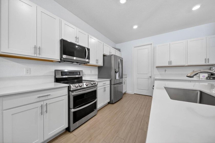 A premium Copper Creek Lennar home offering 5 bedrooms plus a - photo 16
