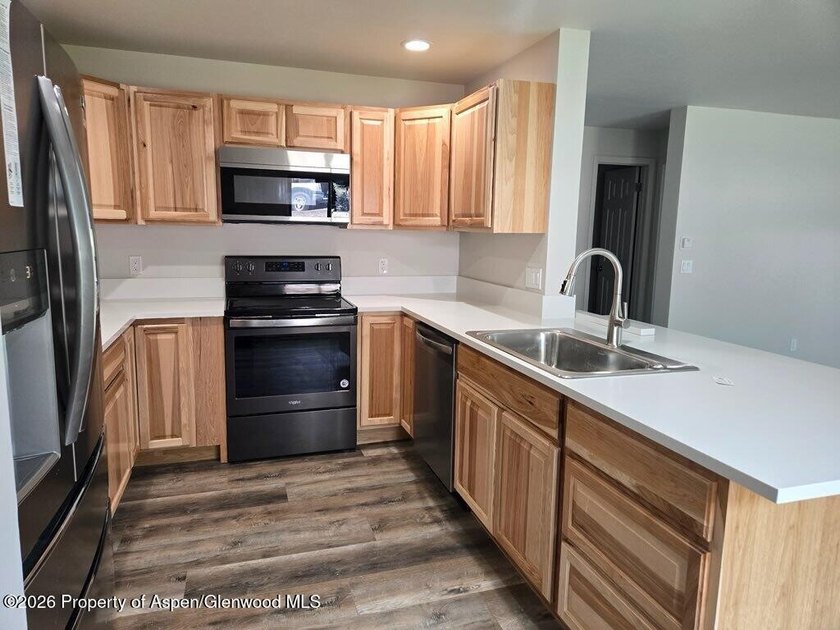This fully remodeled 2-bedroom, 1.5-bath condo offers riverside - photo 3