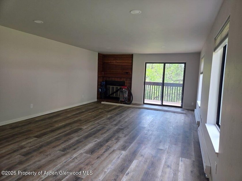 This fully remodeled 2-bedroom, 1.5-bath condo offers riverside - photo 4