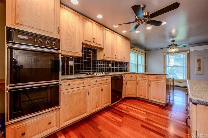 Discover this wide line Expanded Ranch nestled on a dead-end - photo 10