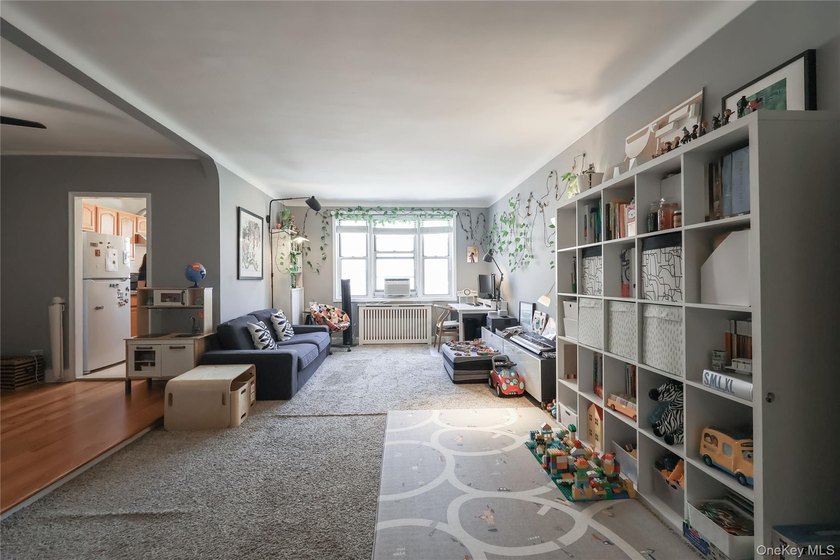 Step into this extra spacious one-bedroom corner unit offering - photo 2
