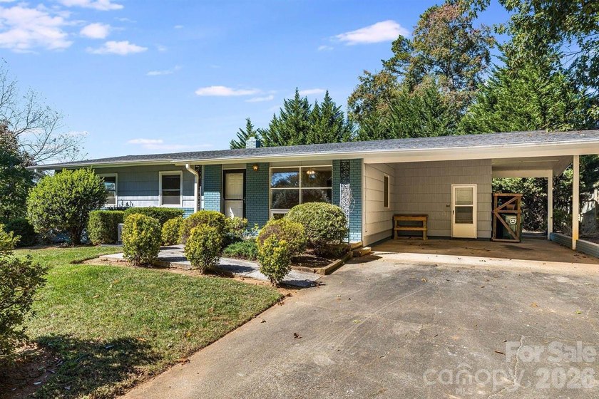 Imagine returning home in sought-after North Asheville. A - photo 3