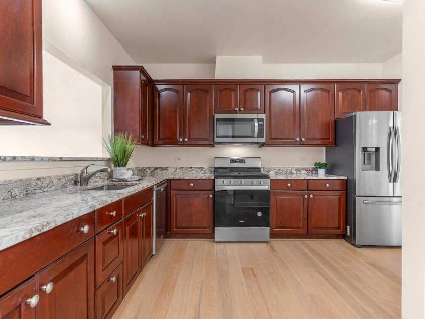 Thoughtfully refreshed and move-in ready. Since its previous - photo 8