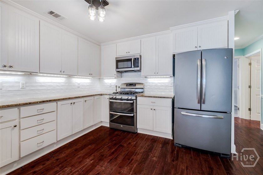 This unique home in the gated community of Causton Bluff has it - photo 29