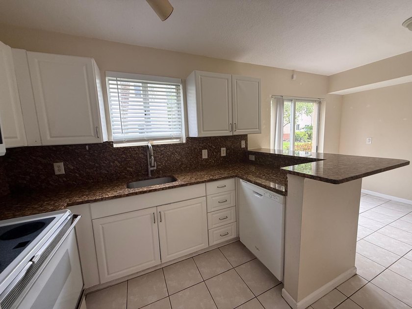 Welcome to this exceptional condominium located in the Cove at - photo 13