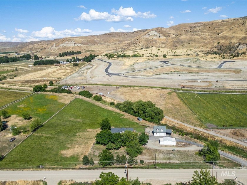 Nestled at the base of Emmett's desirable southeast hills, this - photo 3