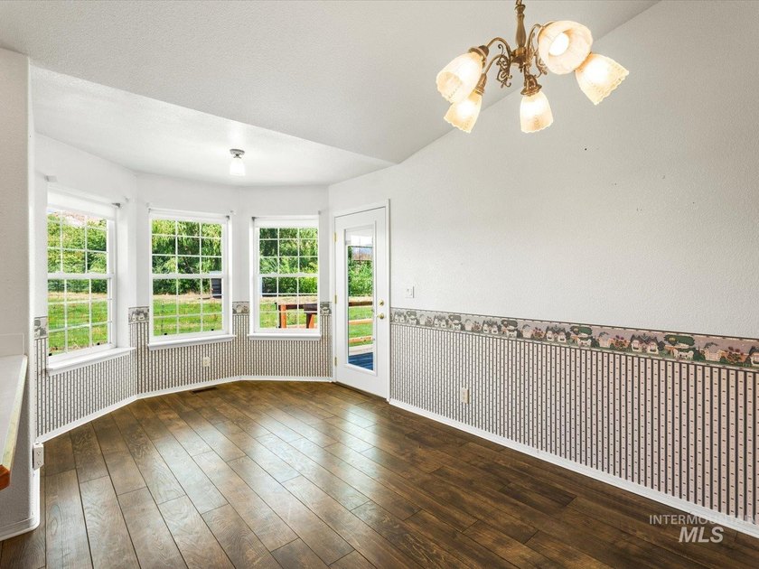 Nestled at the base of Emmett's desirable southeast hills, this - photo 10