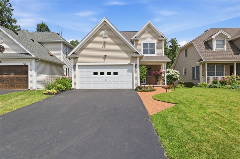 Welcome to 770 Bel Arbor Trail, where refined first-floor living - photo 2
