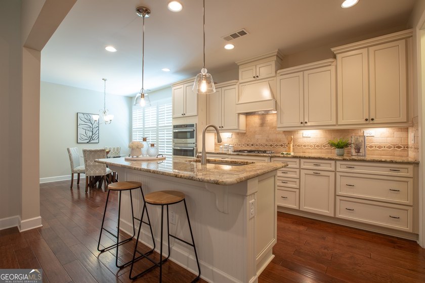 Discover easy living in this beautifully designed, freshly - photo 3