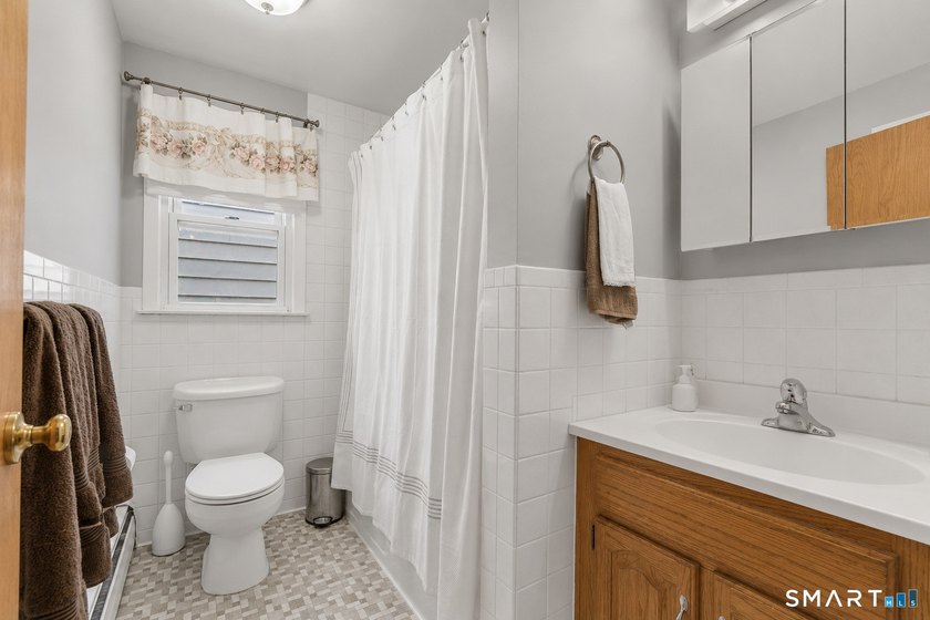 Excellent opportunity to own a well-maintained two-family home - photo 11