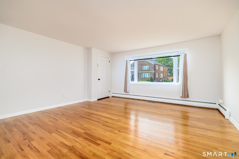 Excellent opportunity to own a well-maintained two-family home - photo 12