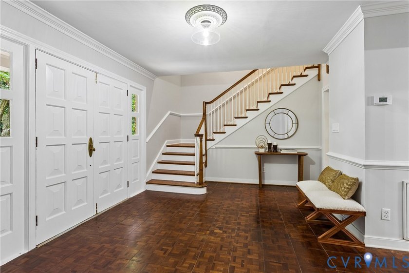 Hidden among mature trees on a rare double lot, this exceptional - photo 12