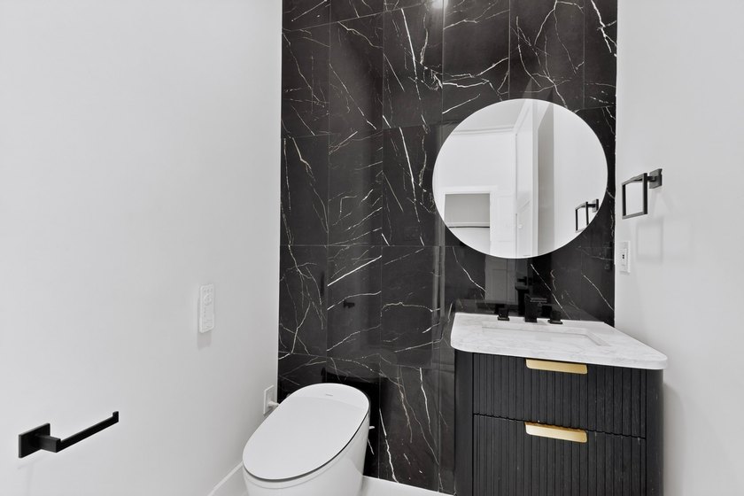 Experience modern waterfront luxury in this stunning - photo 13