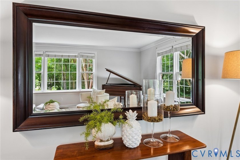 Hidden among mature trees on a rare double lot, this exceptional - photo 17