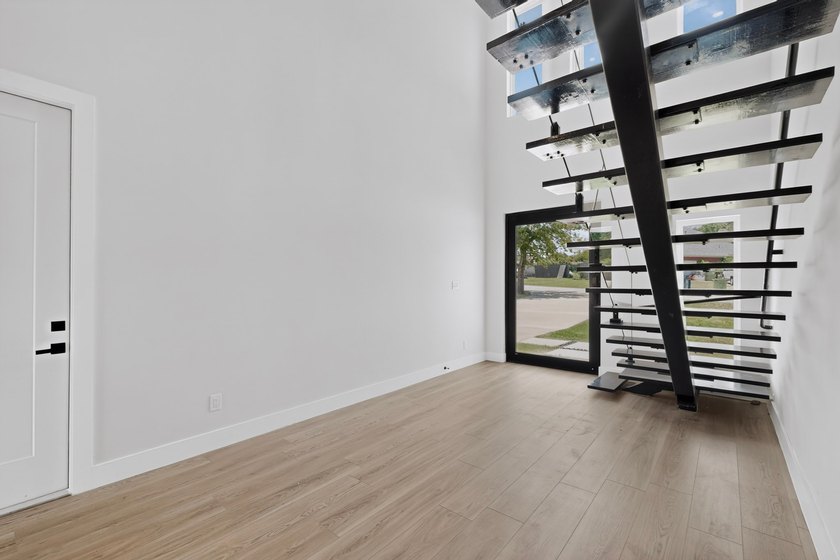 Experience modern waterfront luxury in this stunning - photo 24