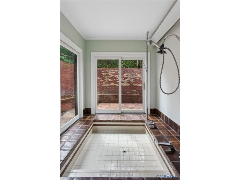Hidden among mature trees on a rare double lot, this exceptional - photo 29