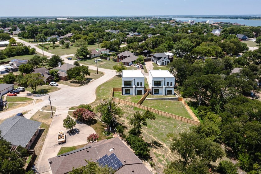 Experience modern waterfront luxury in this stunning - photo 32