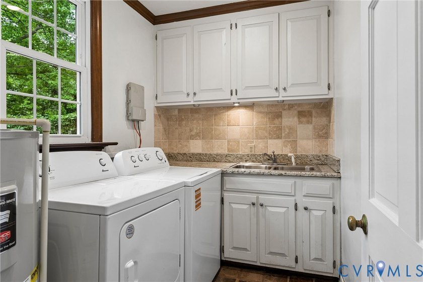 Hidden among mature trees on a rare double lot, this exceptional - photo 44