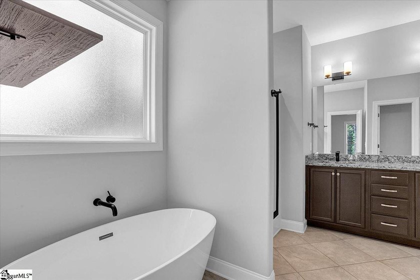 Welcome to this better-than-new craftsman-style ranch, just one - photo 17