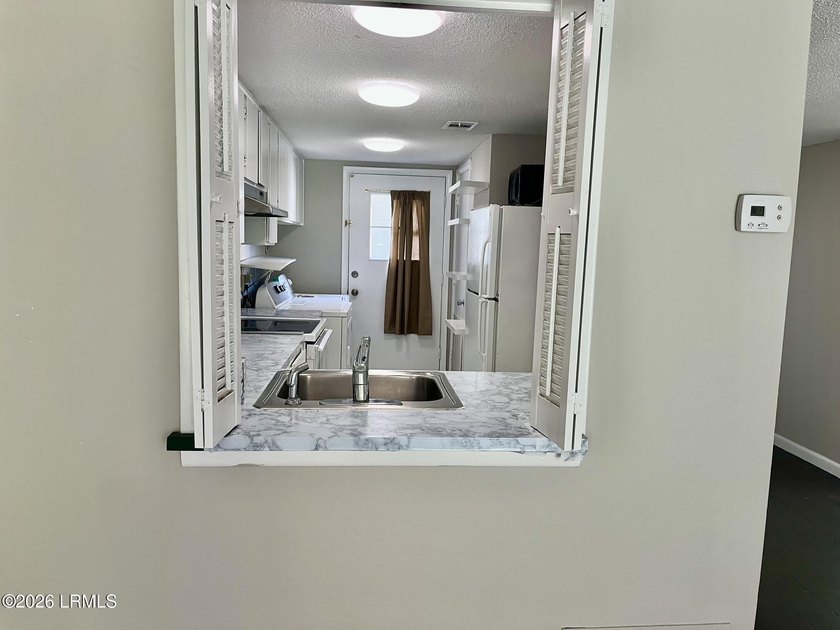 Welcome to Marsh Harbor, this 3 Bedroom 3 Bath unit is move in - photo 7