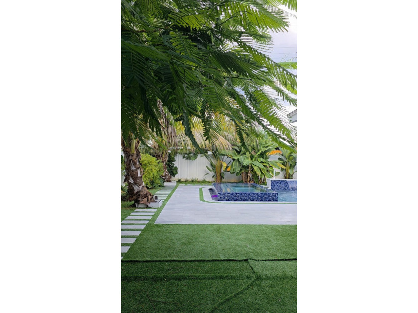 Welcome to this beautifully maintained 4-bedroom, 2-bathroom - photo 30