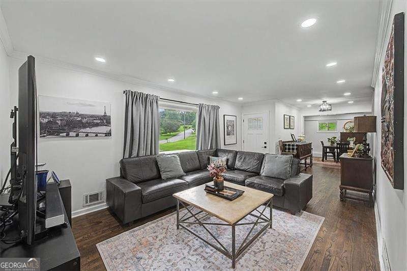 Step into this charming 4-bedroom, 2-bath brick beauty in Cobb - photo 4