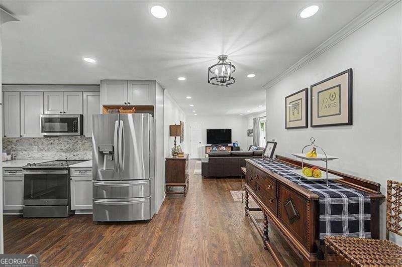 Step into this charming 4-bedroom, 2-bath brick beauty in Cobb - photo 6