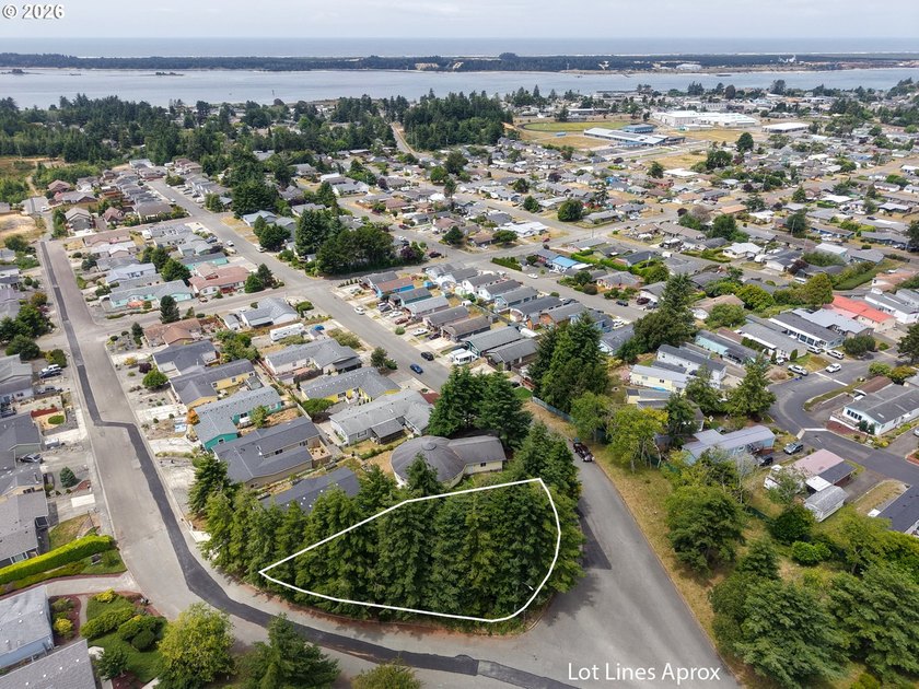 Ocean and bay view lot with utilities already in place! This - photo 2