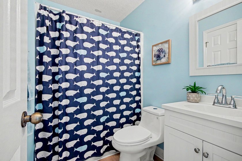 Experience coastal living in a beautifully updated home located - photo 16