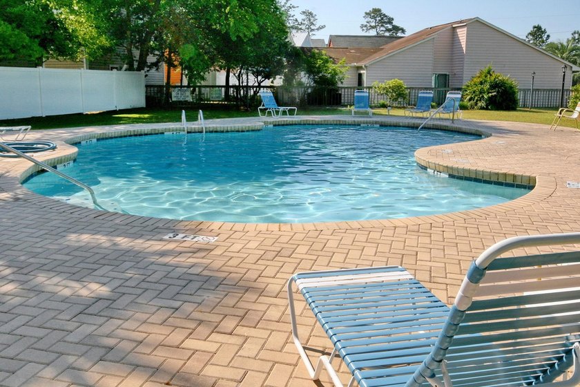 Experience coastal living in a beautifully updated home located - photo 35