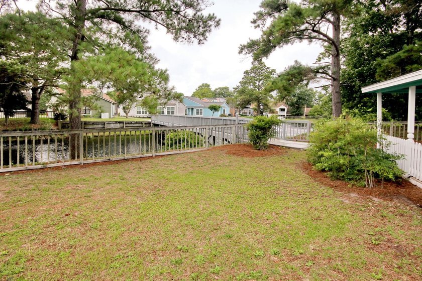 Experience coastal living in a beautifully updated home located - photo 39