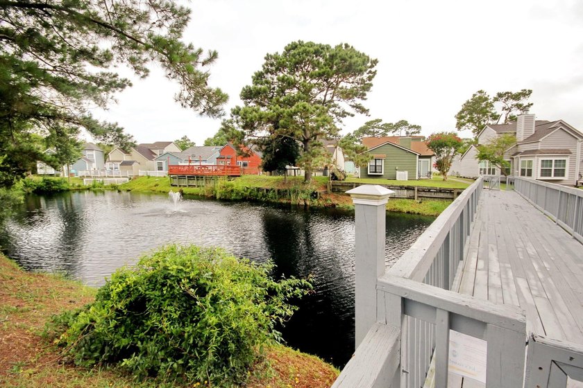 Experience coastal living in a beautifully updated home located - photo 40