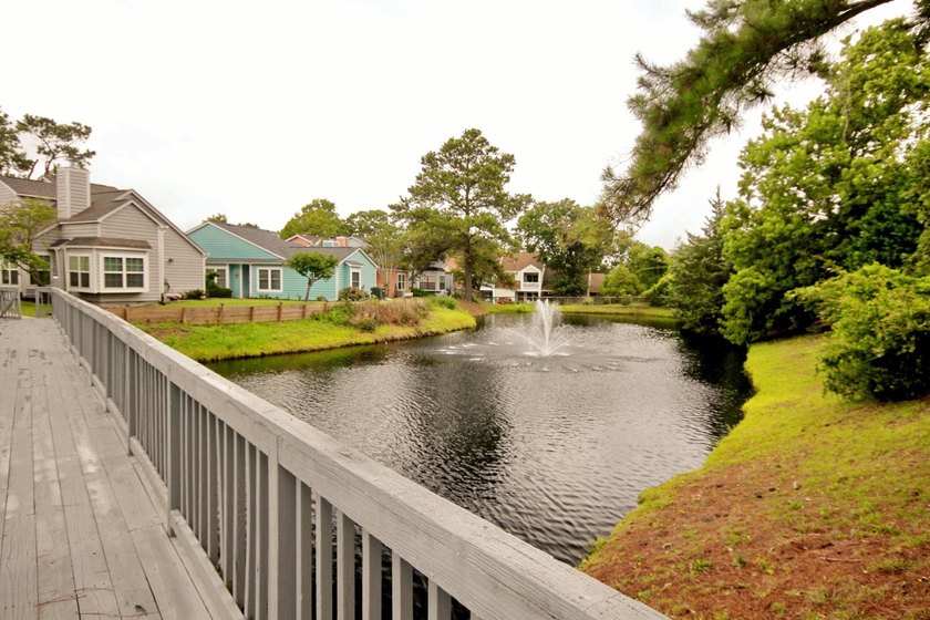 Experience coastal living in a beautifully updated home located - photo 41