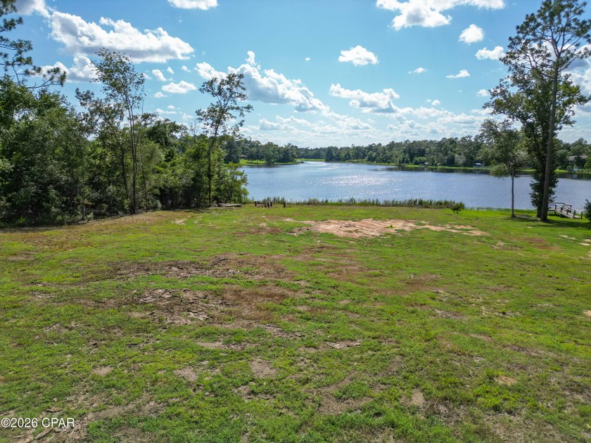 Desirable waterfront lot located on the larger lake in the - photo 3