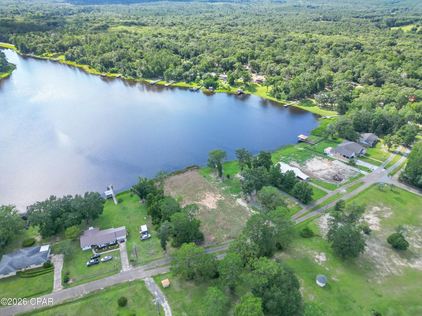 Desirable waterfront lot located on the larger lake in the - photo 7