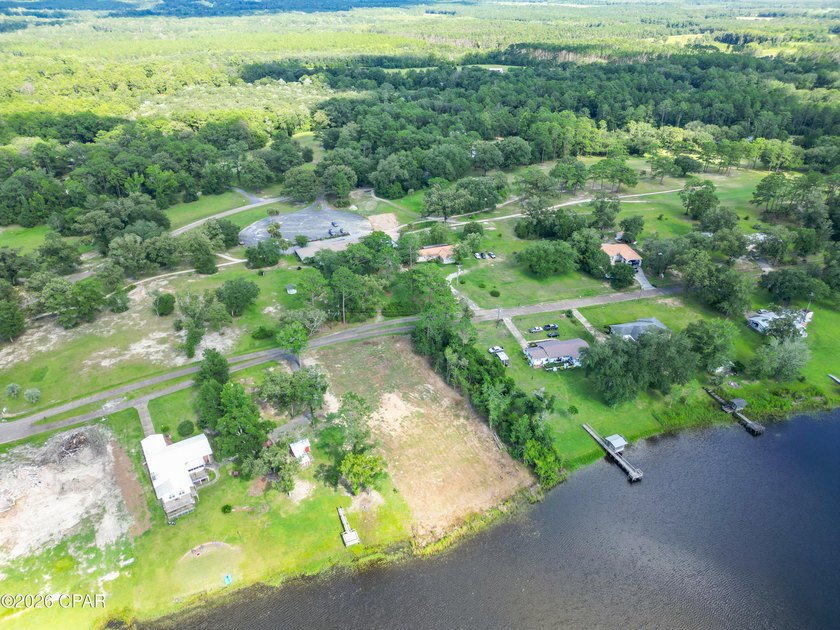 Desirable waterfront lot located on the larger lake in the - photo 9