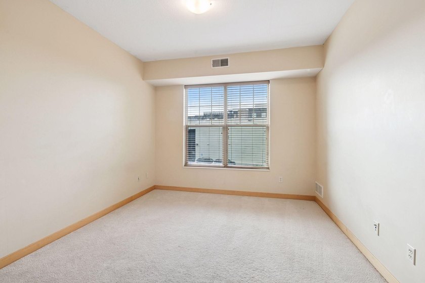 Welcome to this RARE 3 bedroom CORNER unit with 2 underground - photo 11