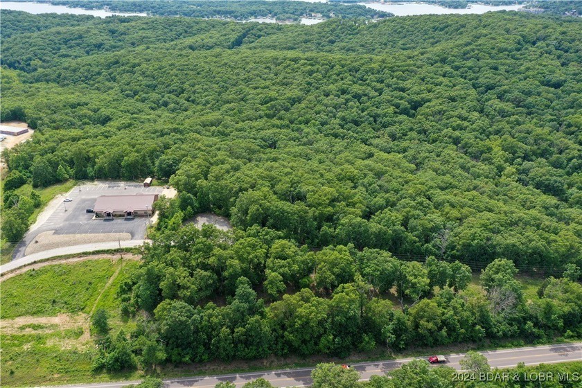 This expansive 5-acre commercial lot boasts exceptional frontage - photo 13
