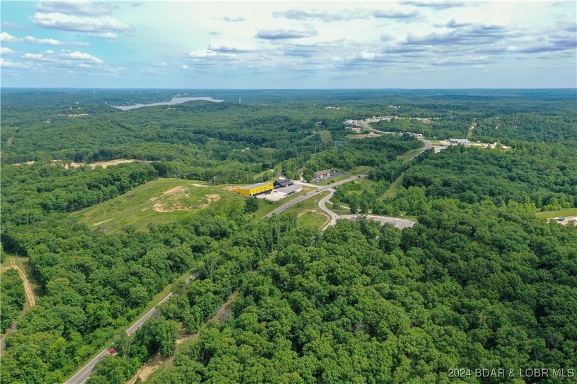 This expansive 5-acre commercial lot boasts exceptional frontage - photo 16