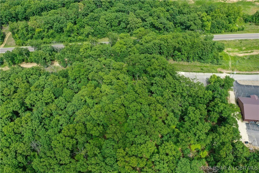 This expansive 5-acre commercial lot boasts exceptional frontage - photo 20