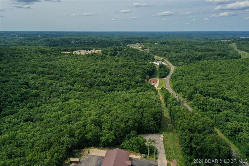This expansive 5-acre commercial lot boasts exceptional frontage - photo 22