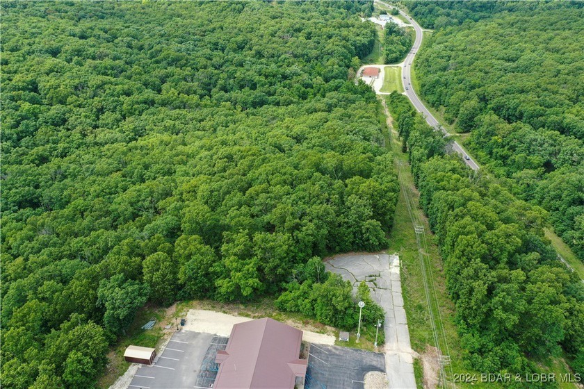 This expansive 5-acre commercial lot boasts exceptional frontage - photo 25