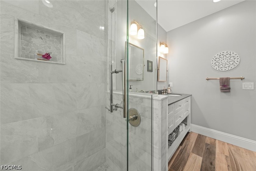 Perfectly positioned on Sanibel Island's coveted east end, just - photo 33