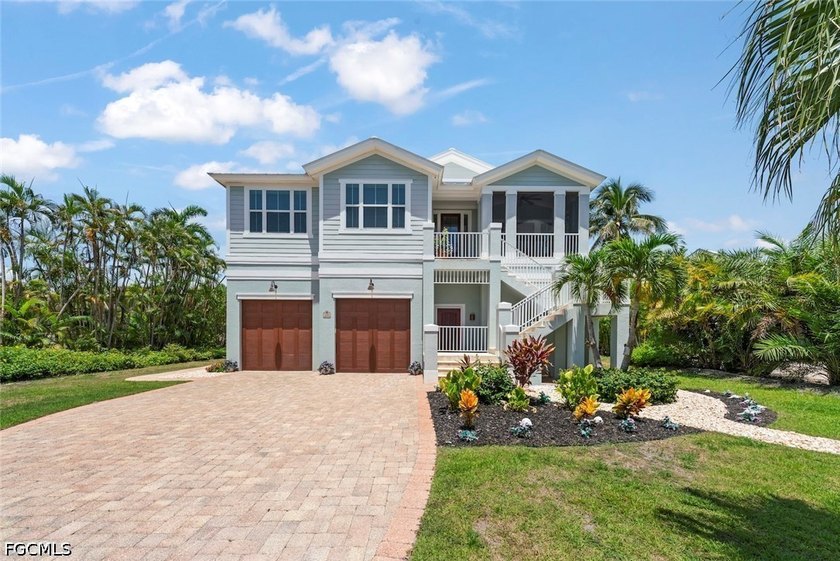 Perfectly positioned on Sanibel Island's coveted east end, just - photo 48