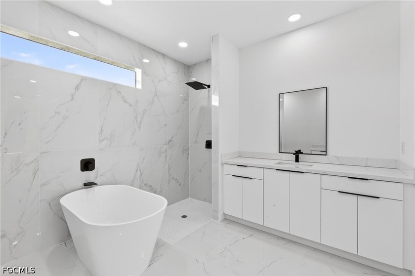 Brand-new modern construction featuring 4 bedrooms, 3 full - photo 14